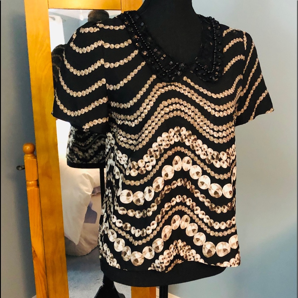 Great jeweled top
